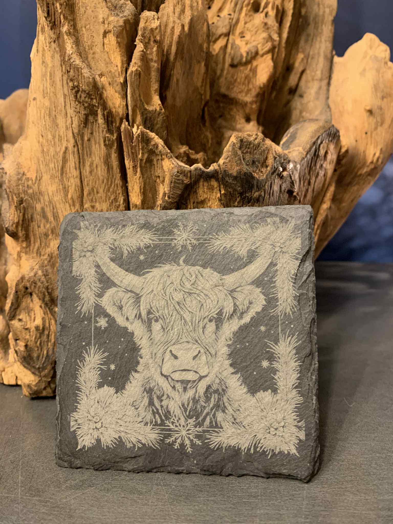 Laser engraving in progress at Etched Essence